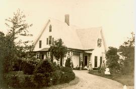 Patterson Residence with P. Patterson and daughter Lizzie in foreground and Mrs. Patterson and Al...